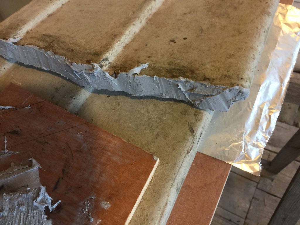 coat broken concrete surface with fill-it epoxy filler