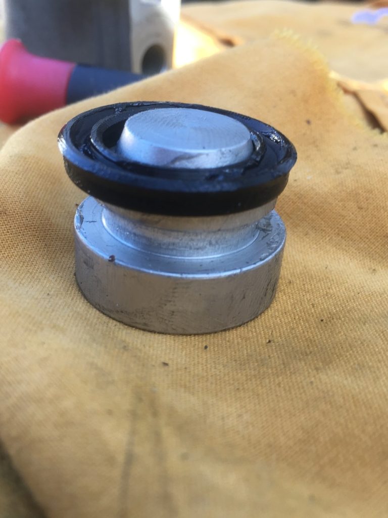 Apply silicone grease to piston and new seal on ducati clutch slave cylinder
