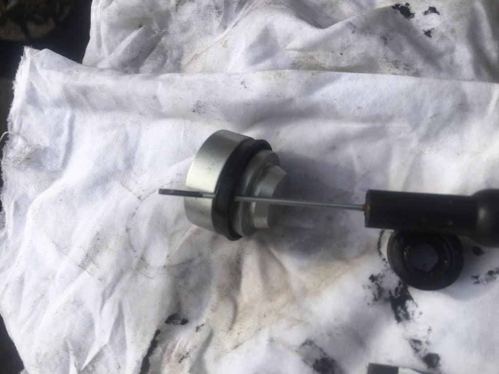 refit seal to piston of aprilia clutch slave cylinder