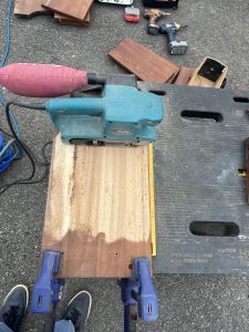 use belt sander cross grain to clean when epoxy sealing wood