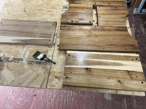 epoxy sealed wood applying first coat to acacia